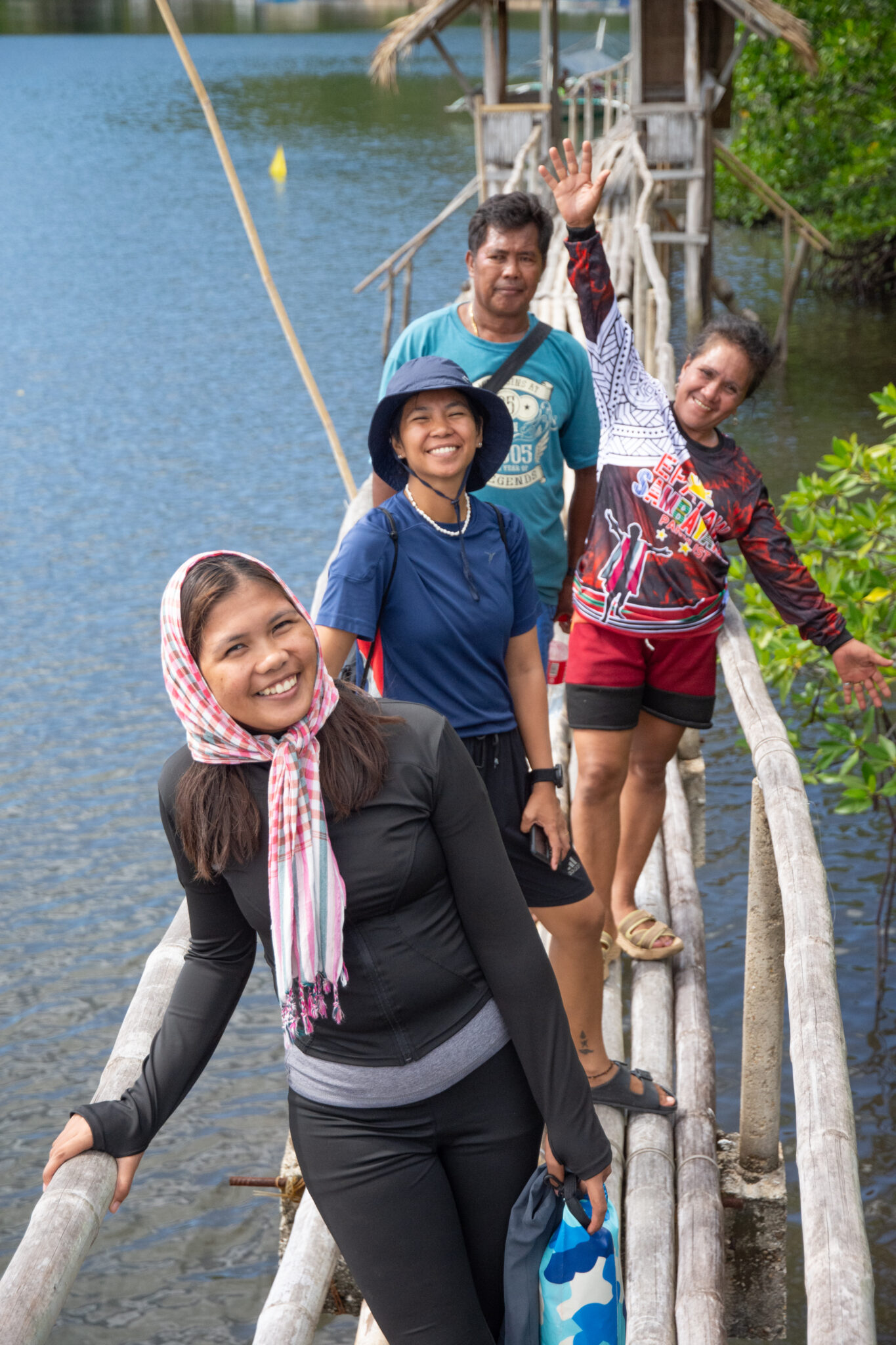 Group of smiling people on boardwalk