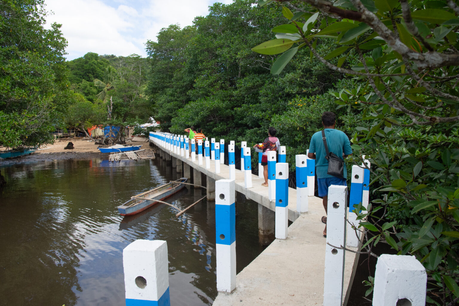 People head for shore on unfinished boardwalk extension