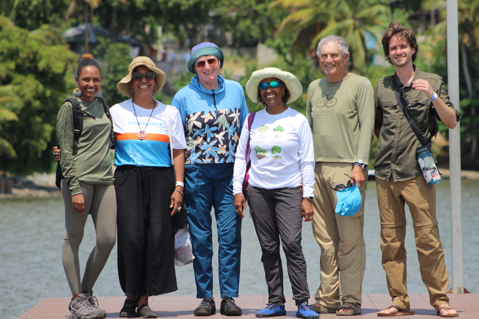 group of Seacology staff posing on dock